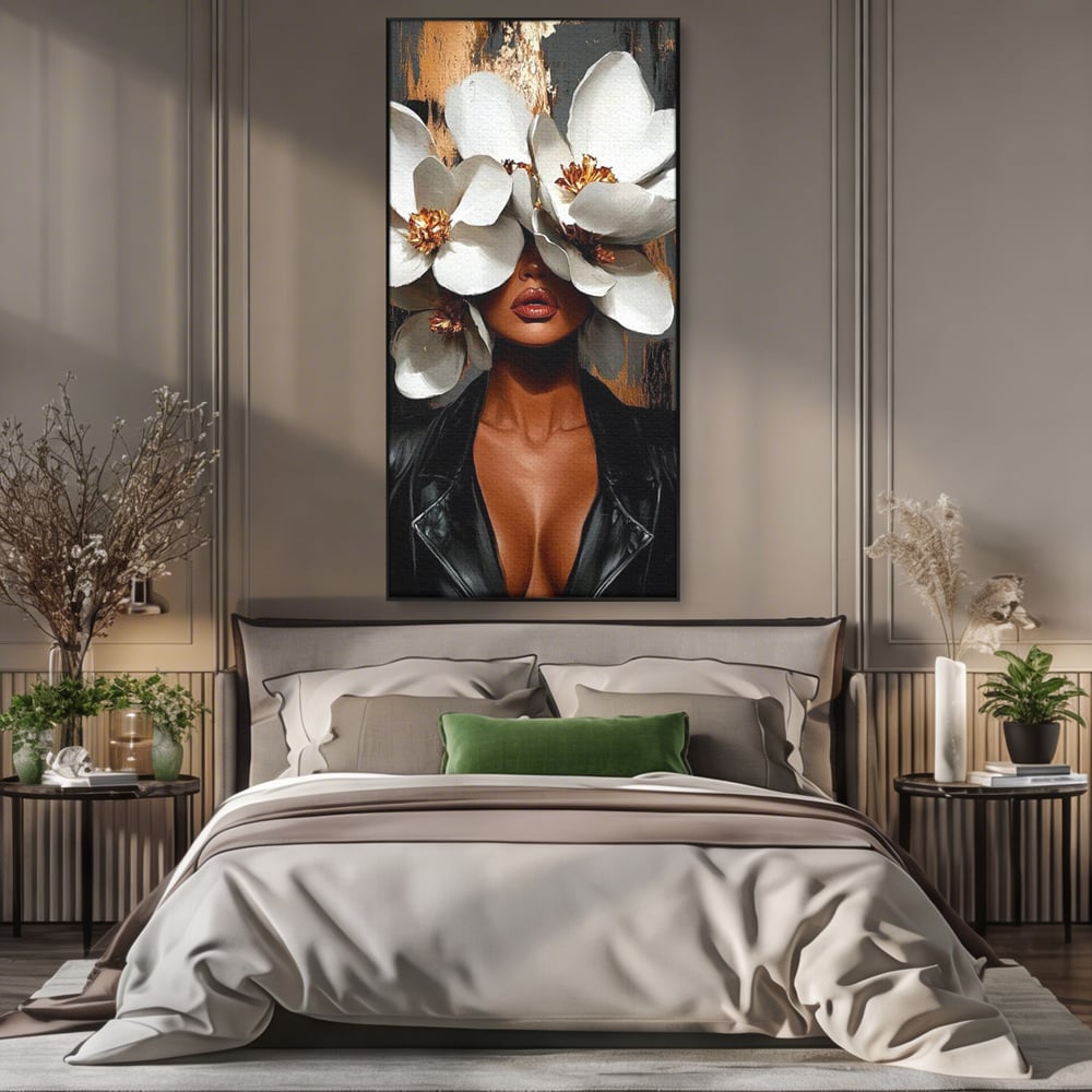 Tablou canvas cu tablou canvas cu femeie si magnolii, in rama de aluminiu negru, pe perete intr-un dormitor
